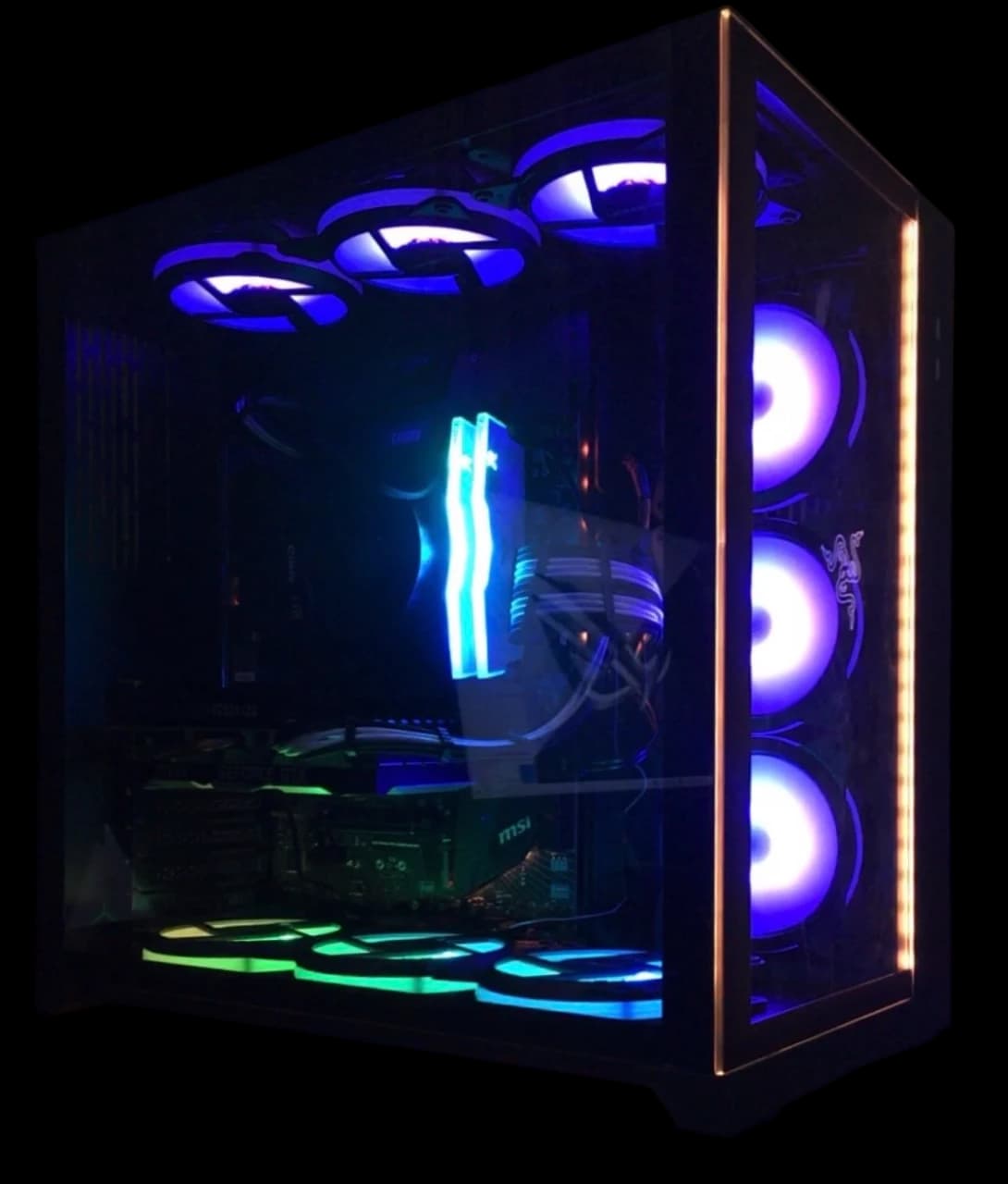M1 completed gaming PC build with an AMD Ryzen 5 3600 and NVIDIA GTX 1660 Ti, black-and-white case with multicolor ARGB fan lighting.