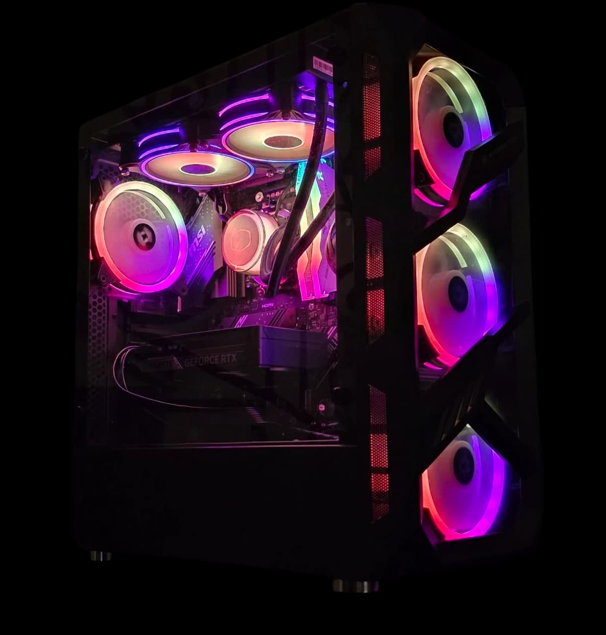 M1 completed gaming PC build with an AMD Ryzen 5 7600X and NVIDIA RTX 5060 Ti, black case with purple ARGB fan lighting.